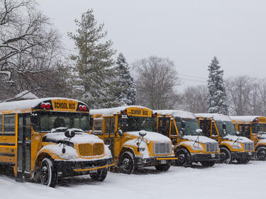 School bus parked in snow